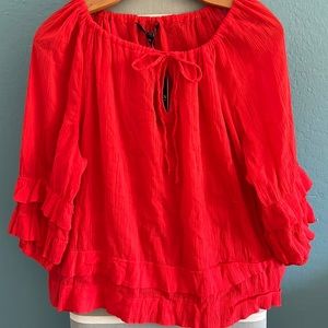 Ralph Lauren. It’s a S/P but the size runs very big.